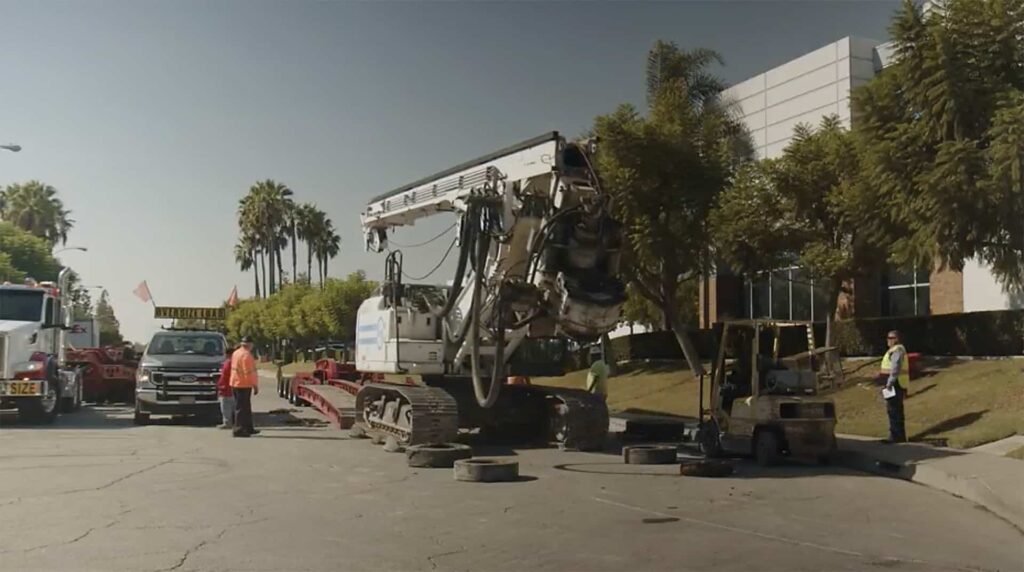 Shoring Engineers crane moving to a jobsite